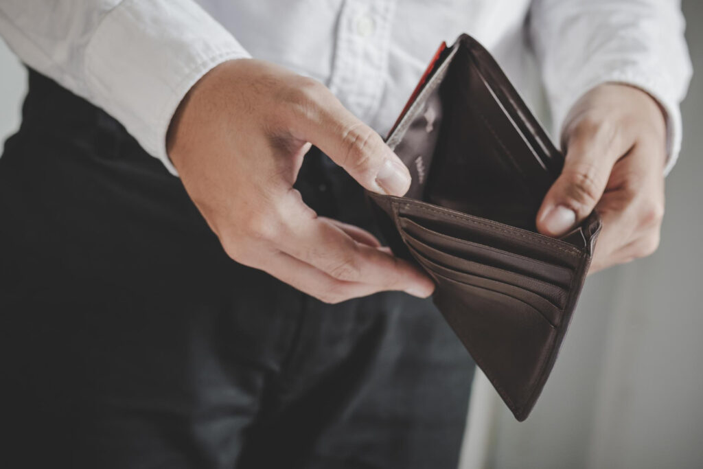 Male holding and open an empty wallet