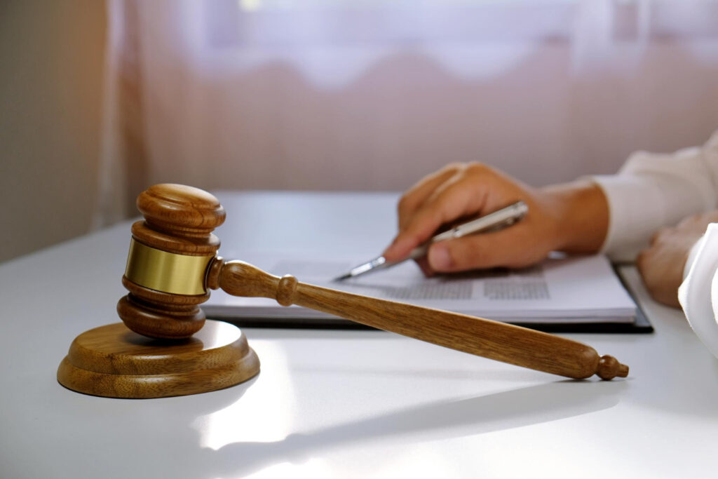 Lawyer reading documents on desk