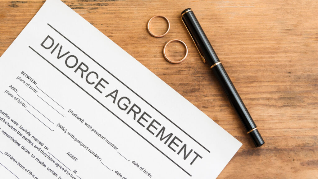 Divorce agreement on wooden table