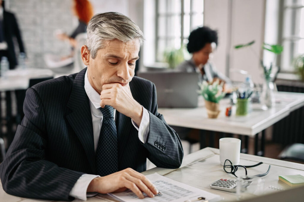 Businessman sitting at desk in the office