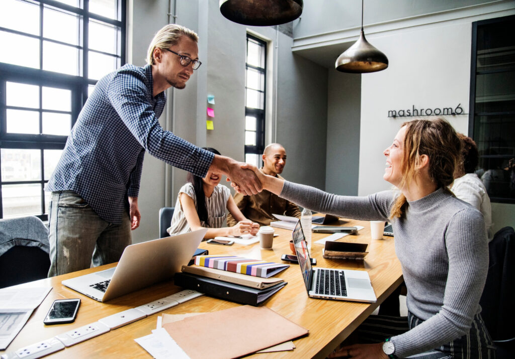 Business people shaking hands in agreement