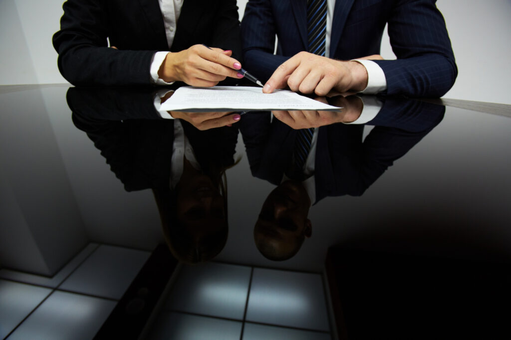 Businessmen reflected on the table